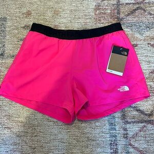 Women’s hot pink north face shorts